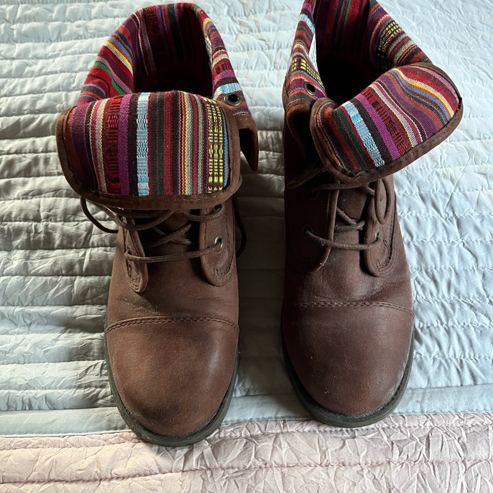 Dark brown boots with multi-color inside. Size 10